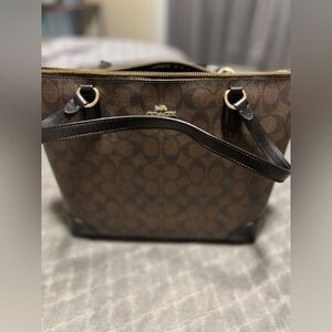 Coach handbag, brown, and black